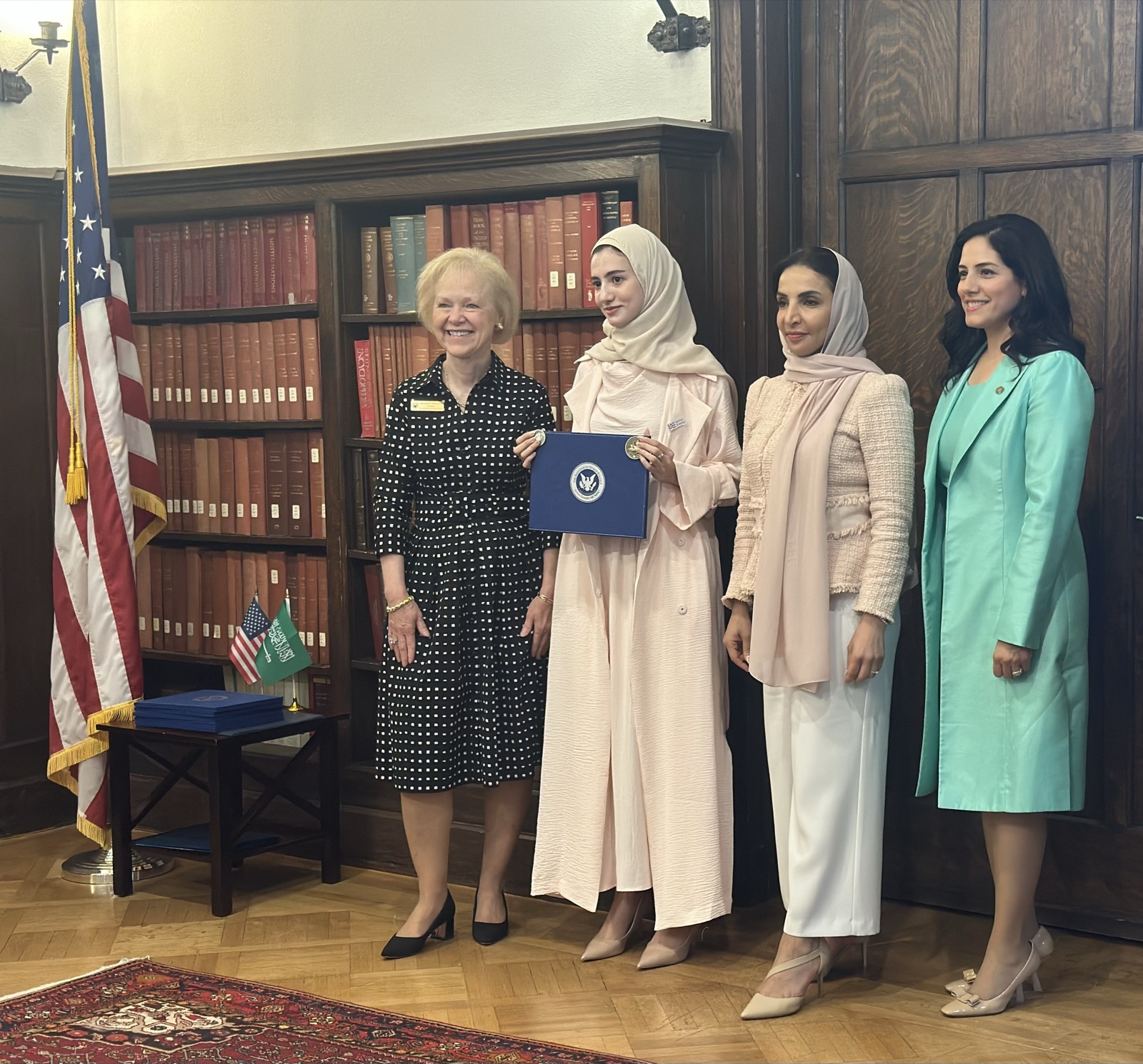 Receiving recognition from the Institute of World Politics for WEDL